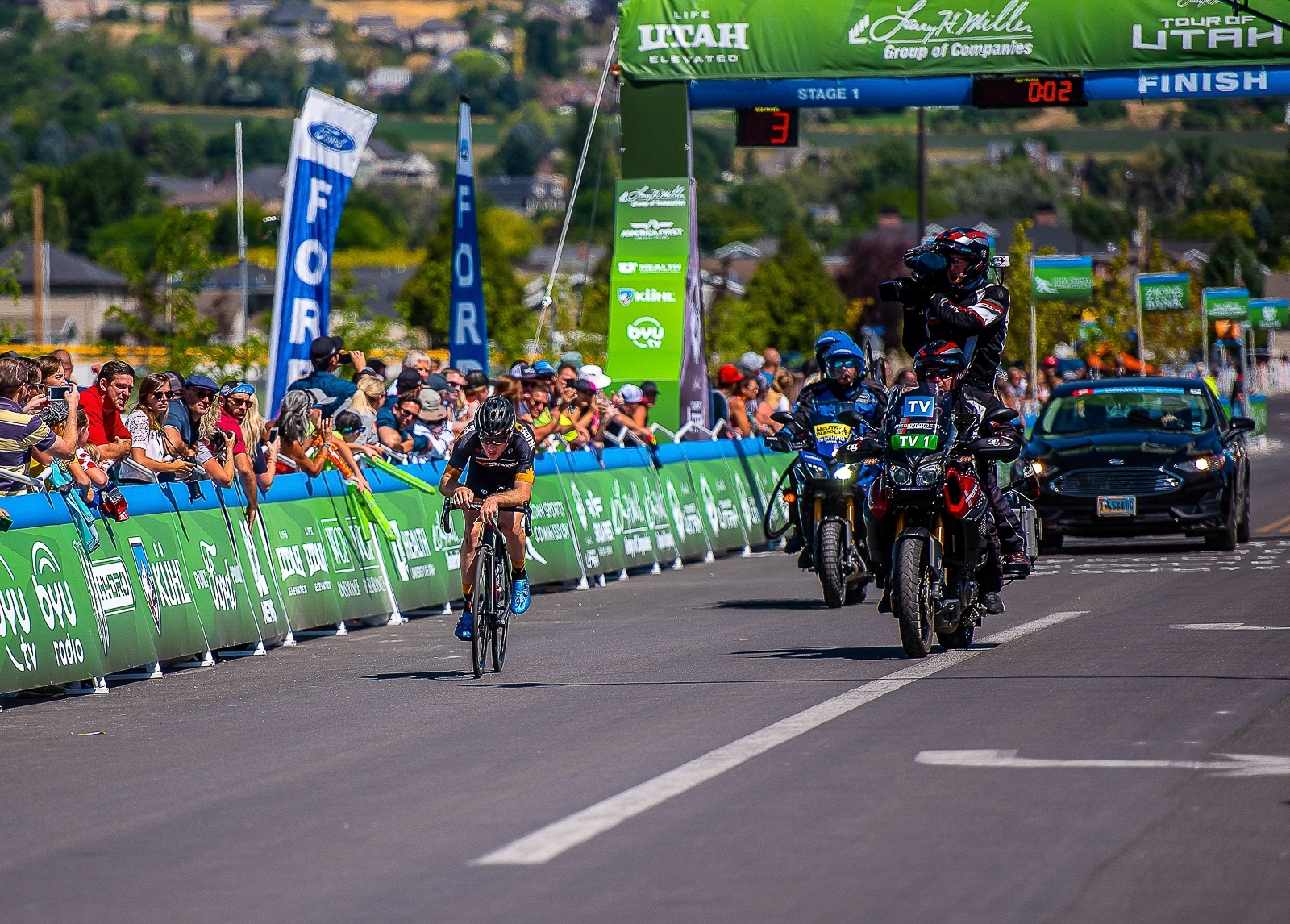 A DC Bank rider is solo off the front with 3 laps of the finishing circuit to go. Stage 1, 2019 Tour of Utah. Photo by Steven L. Sheffield