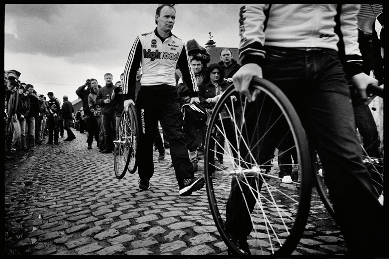 Soigneurs with spare wheels are spread all along the race. Extreme events like Paris-Roubaix can mean up to 20 extra mechanics and team helpers out on the course. Photo by Taz Darling.